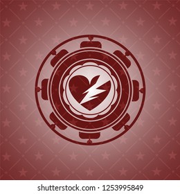 broken heart icon inside red icon or emblem