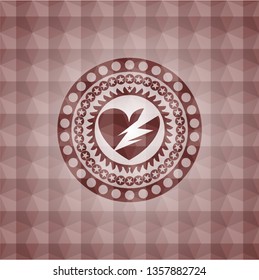 broken heart icon inside red seamless badge with geometric pattern.