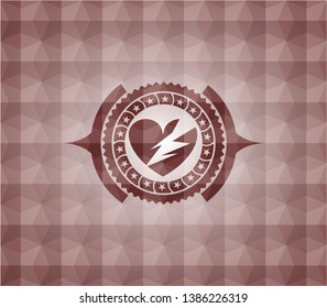 broken heart icon inside red seamless geometric emblem.