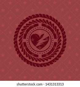 broken heart icon inside red icon or emblem