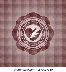 broken heart icon inside red seamless emblem with geometric pattern background.