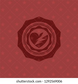 broken heart icon inside retro style red emblem