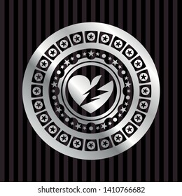 broken heart icon inside silver shiny badge