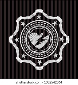 broken heart icon inside silvery badge