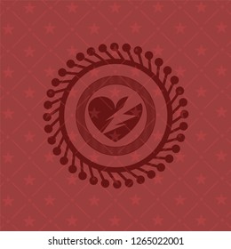 broken heart icon inside vintage red emblem