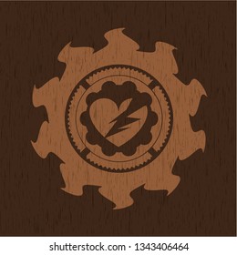 broken heart icon inside wood badge or emblem