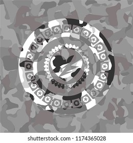broken heart icon on grey camo texture