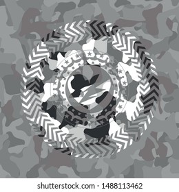 broken heart icon on grey camouflage pattern