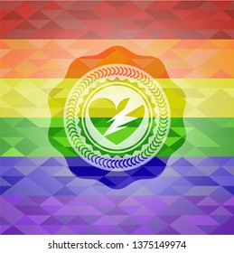 broken heart icon on mosaic background with the colors of the LGBT flag