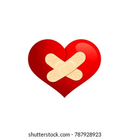 Broken heart with plaster stock image.