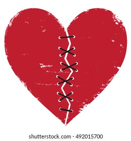 Broken heart with thread stitches vector illustration
