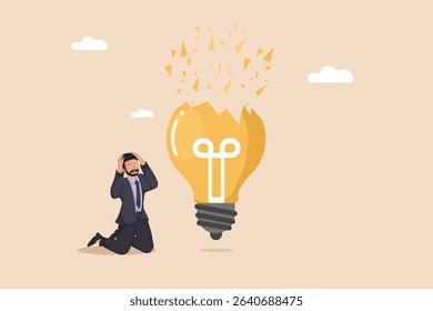 Broken Idea and Frustration: Businessman Kneeling Beside a Shattered Light Bulb, Symbolizing Failed Innovation, Business Problems, and Stress.