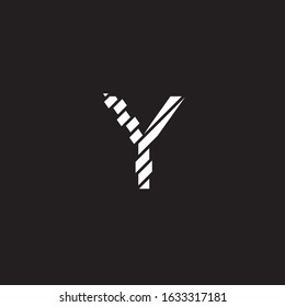 broken pieces forming the letter Y