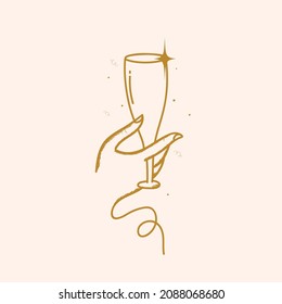 Bronze Linear Style Female Hand Holding Champagne Glass On Pastel Pink Background.