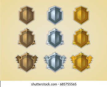 Bronze, silver, gold shields.  Set of cartoon icons for the user interface for mobile games or applications. Isolated vector illustration
