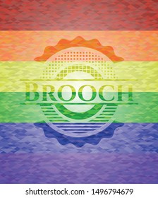 Brooch emblem on mosaic background with the colors of the LGBT flag
