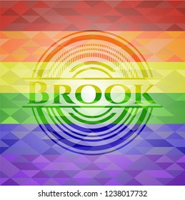 Brook emblem on mosaic background with the colors of the LGBT flag
