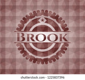 Brook red seamless badge with geometric pattern background.