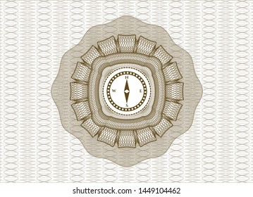 Brown abstract rosette with compass icon inside