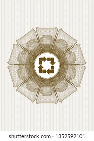 Brown abstract rosette with recycle icon inside