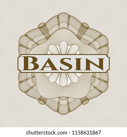 Brown abstract rosette with text Basin inside