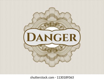 Brown abstract rosette with text Danger inside