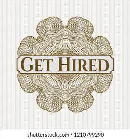 Brown abstract rosette with text Get Hired inside