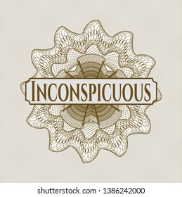 Brown abstract rosette with text Inconspicuous inside