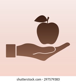 Brown Apple Icon in hand - vector icon 
