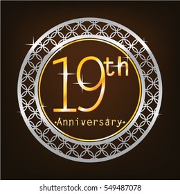 brown background and silver circle 19th anniversary