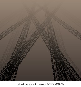 Brown background with three black tire tracks silhouettes