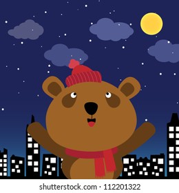 Brown bear in the city at night