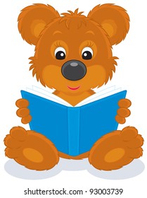 brown bear cub reading a blue book