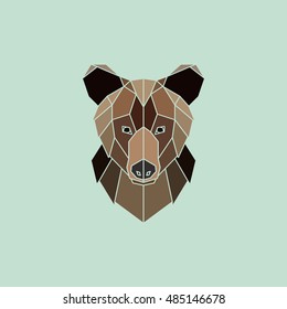 Brown bear portrait. Abstract low poly design. Vector illustration.