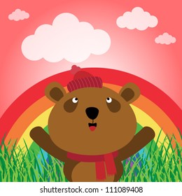 Brown bear with rainbow in the forest
