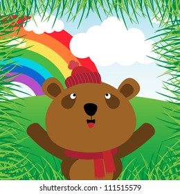 Brown bear with rainbow in the forest