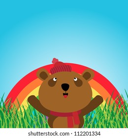 Brown bear with rainbow in the forest