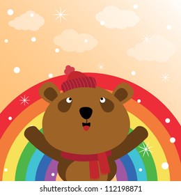 Brown bear and rainbow in the sky