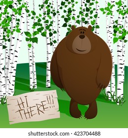 Brown bear stands in the forest of white birches saying Hi there!!!