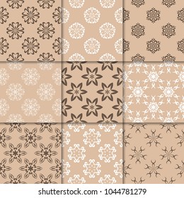 Brown beige floral ornaments. Collection of seamless patterns for paper, textile