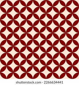 Brown and beige seamless vector graphic of a matrix of overlapping circles. Each overlap is brown and everything is on a beige background