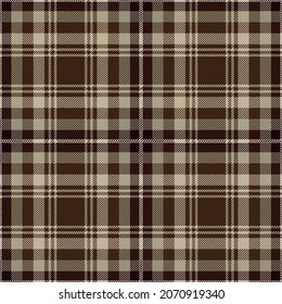 Brown and beige tartan plaid. Scottish pattern fabric swatch close-up. 