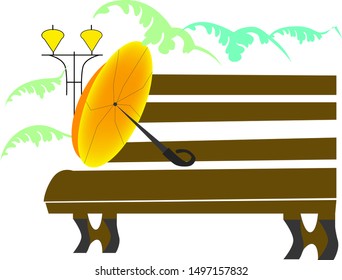 Brown bench with yellow umbrella