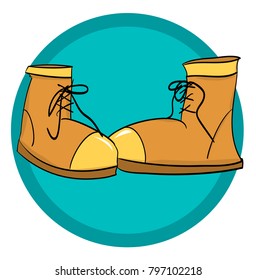 brown boots at green background