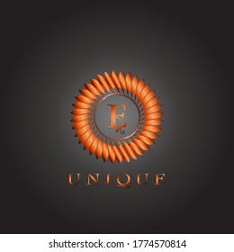 Brown Circle Feather Luxury Floral Initial E Letter Logo  Design. Elegance Monogram unique indian emblem ornate nature floral leaf with initial letter.