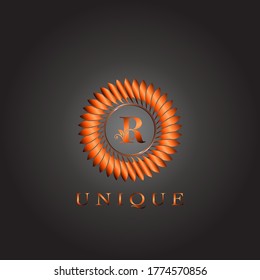 Diseño del logotipo de la letra R inicial de color floral de lujo en forma de piel de círculo marrón. Elegancia Monograma único emblema indio ornato naturaleza floral hoja con letra inicial.