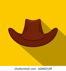 Brown cowboy hat icon. Flat illustration of brown cowboy hat vector icon for web on yellow background