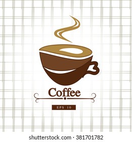 Brown cup of coffee on light background.