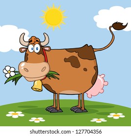 Brown Dairy Cow With Flower In Mouth On A Meadow