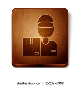 Brown Delivery man with cardboard boxes icon isolated on white background. Door to door delivery by courier. Wooden square button. Vector Illustration